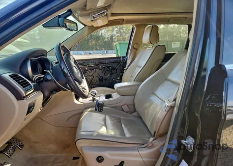 2014 Jeep Grand Cherokee Overland из США, поврежденный, VIN 1C4RJECG1EC281970